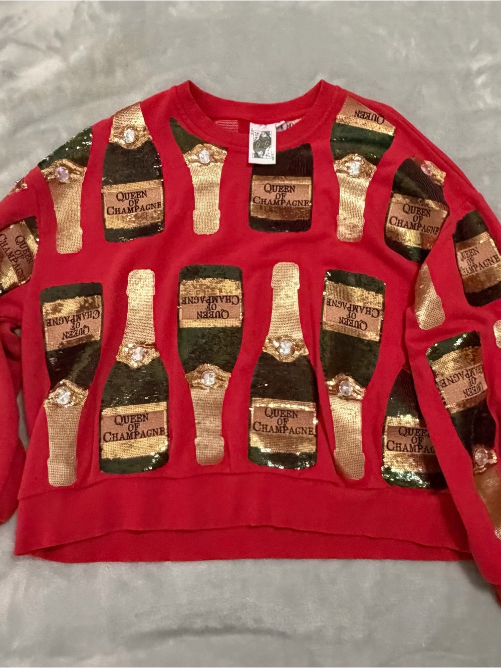QUEEN OF SPARKLES Red and Gold Champagne Bottle Sequin Sweatshirt